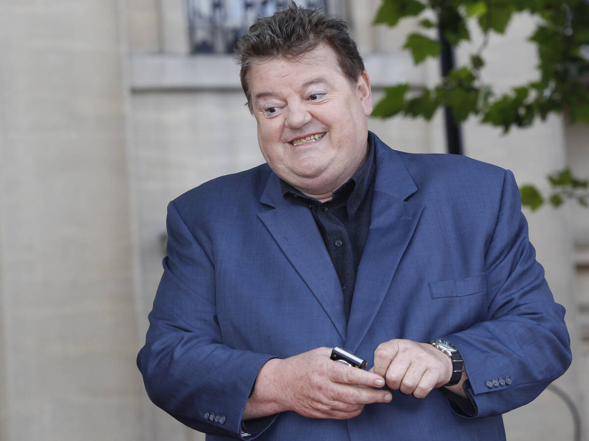FILE - British actor Robbie Coltrane arrives in Trafalgar Square, in central London, for the Wo ...