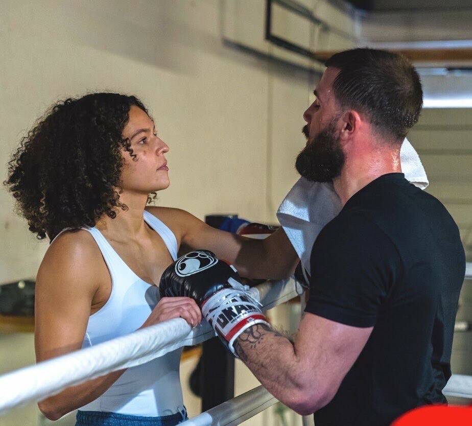 Jordan and Caleb Plant confer during a workout. Courtesy Jordan Plant