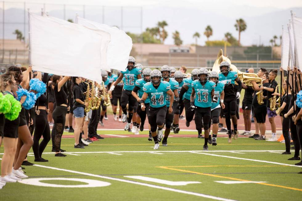 Silverado High School football team runs out onto the field as they host Sierra Vista on Friday ...