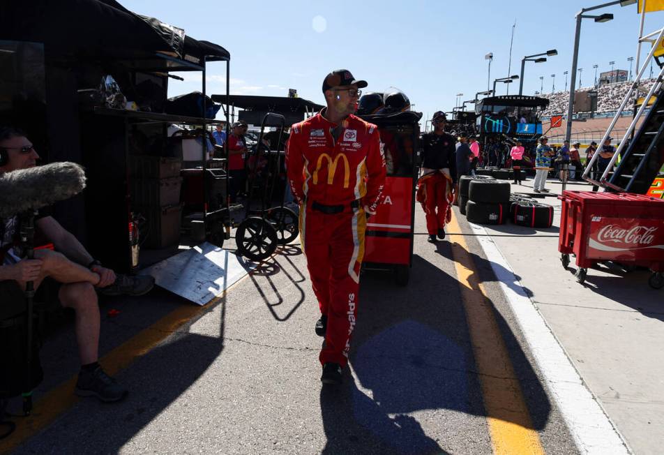 Pit crew members of NASCAR Cup Series driver Bubba Wallace (45) leave pit road after Wallace wa ...