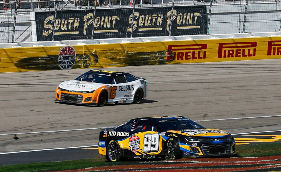 Driver Daniel Suarez (99) slides onto the infield grass during the South Point 400 NASCAR Cup S ...