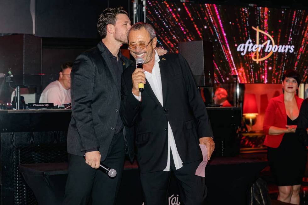 Dustin Drai plants one on his father, Victor, at Drai's After Hours' 25th anniversary at the Cr ...