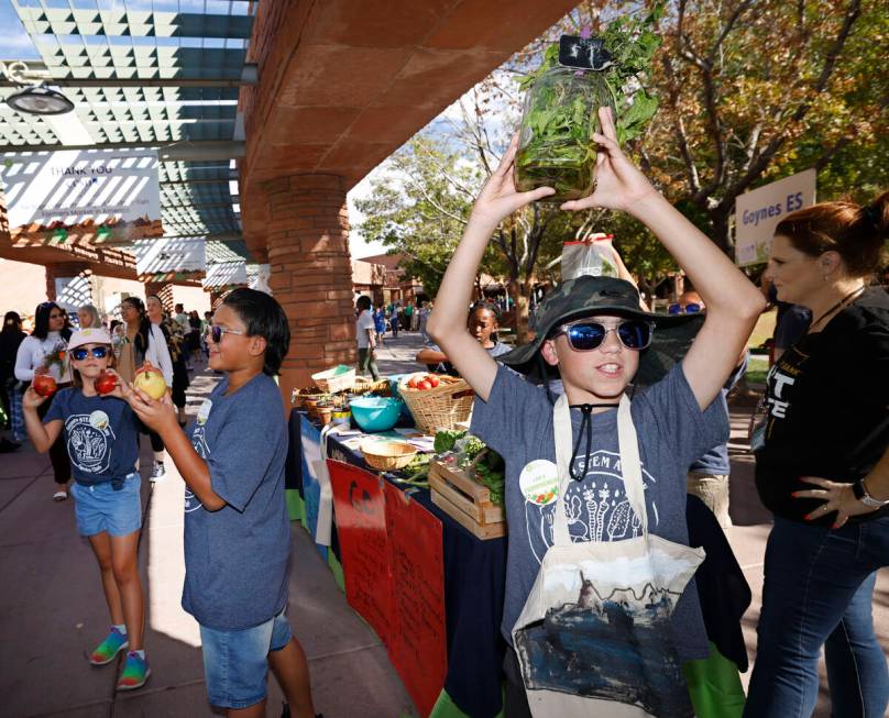 Goynes Elementary School student Connor Thompson, 10, right, sells products on Thursday, Oct. 2 ...