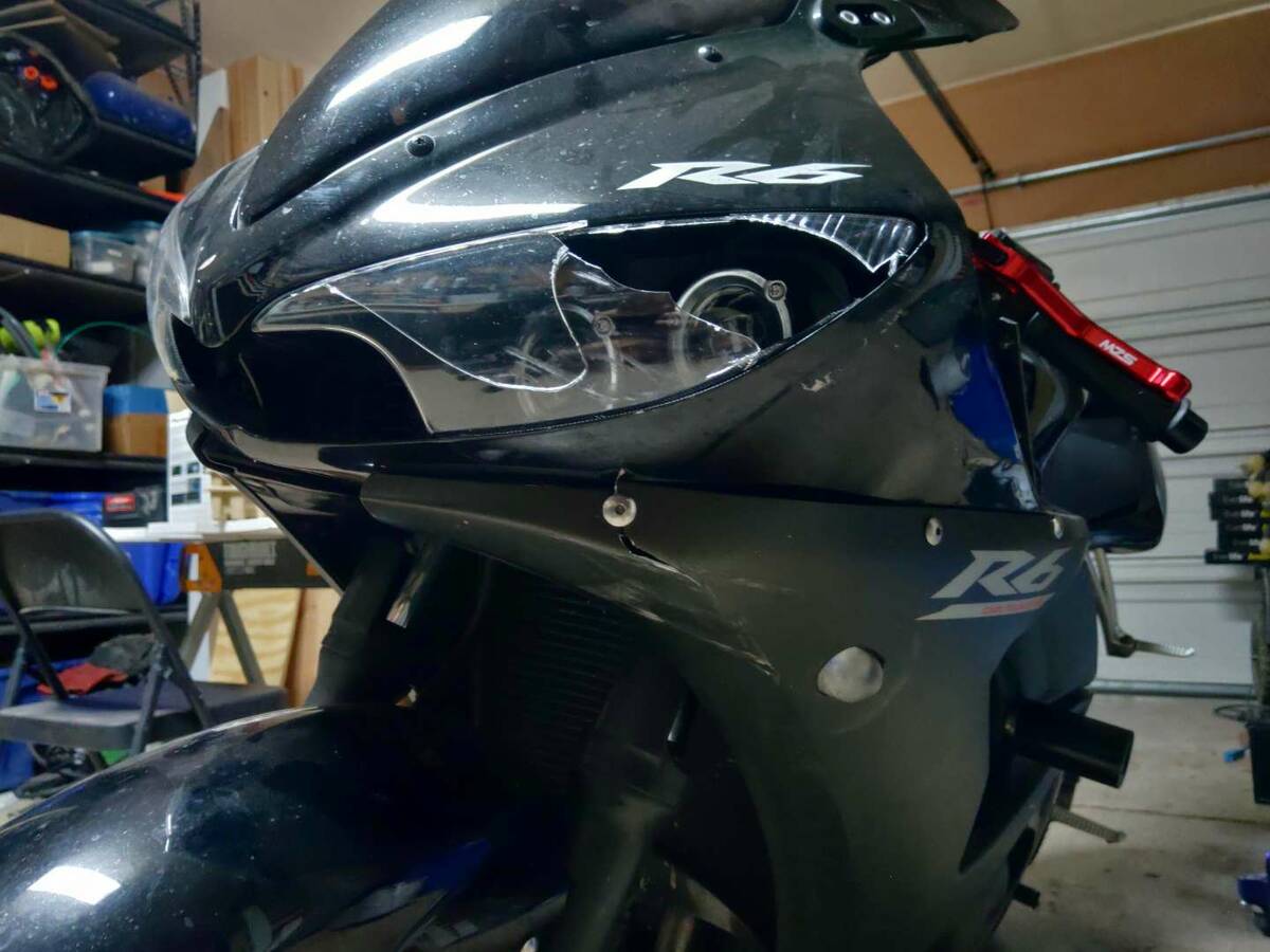 Damage to the Yamaha motorcycle's headlight is shown in this photo provided by Kevin Dammers, w ...