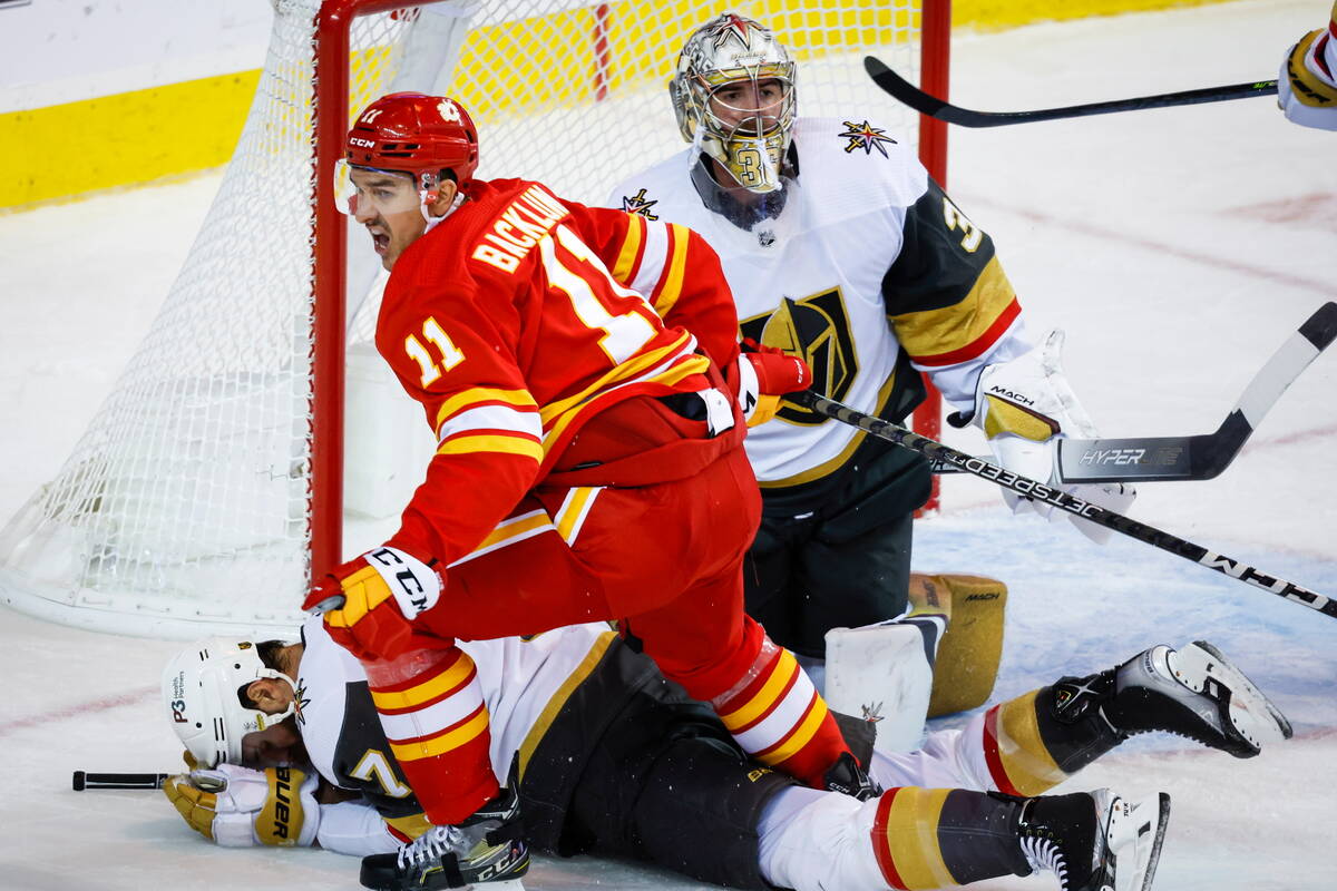 Calgary Flames forward Mikael Backlund (11) celebrates his goal on Vegas Golden Knights goalie ...