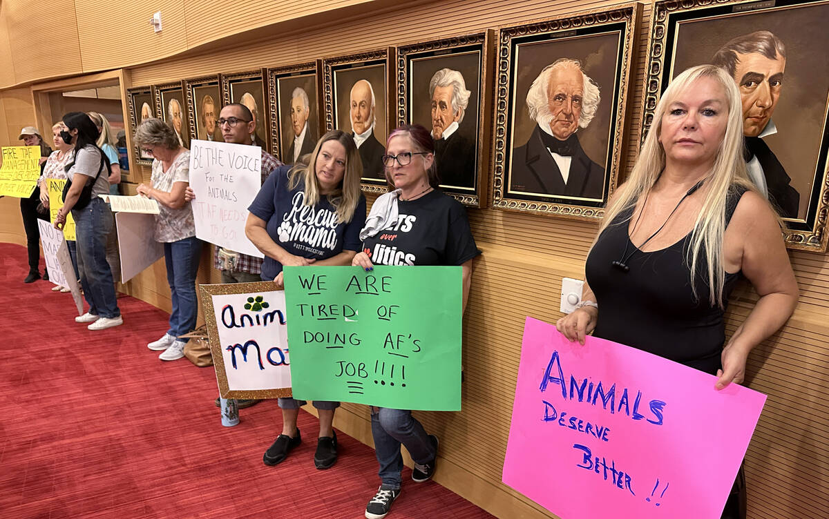 Protesters of The Animal Foundation shelter, including from right, Eva Andrade, Tracy Paz and J ...