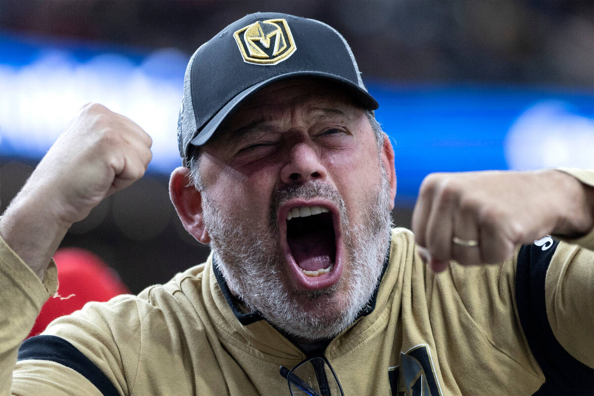 Original Golden Knights season ticket holder Cliff Schechter screams after center Jonathan Marc ...