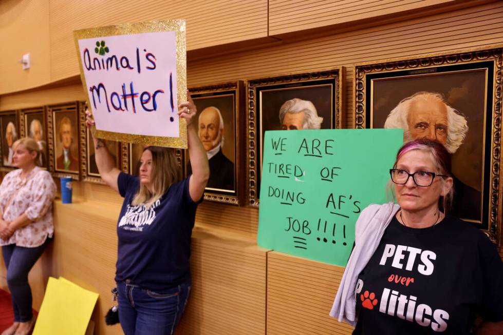 Protesters of The Animal Foundation shelter, including Tracy Paz, right, and Judy Marshall, dur ...