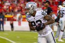 Raiders tight end Darren Waller (83) makes a catch before an NFL game against the Kansas City ...
