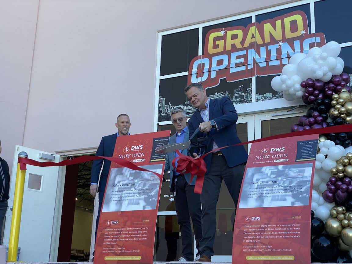 Southern Glazer's executives cut the ribbon for the opening of the company's warehouse liquor s ...