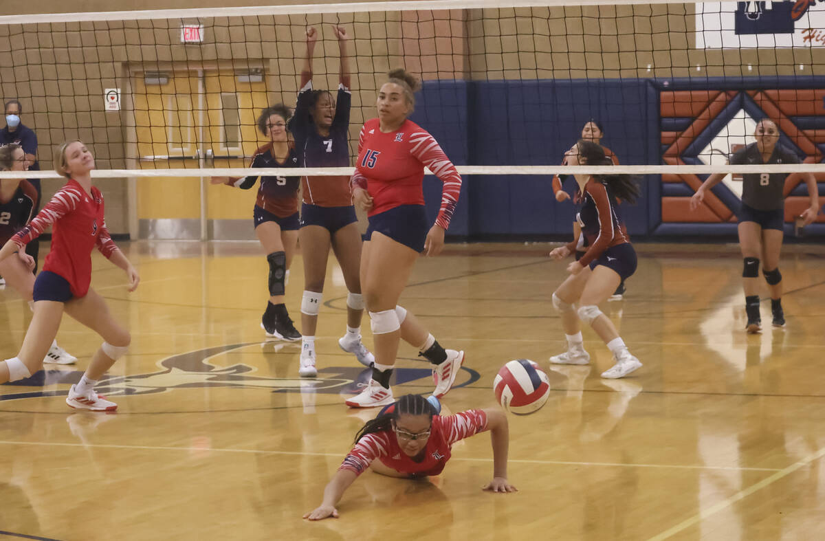 Liberty's Jayda Hutchins (7) comes up short on a play against Legacy during a volleyball game a ...