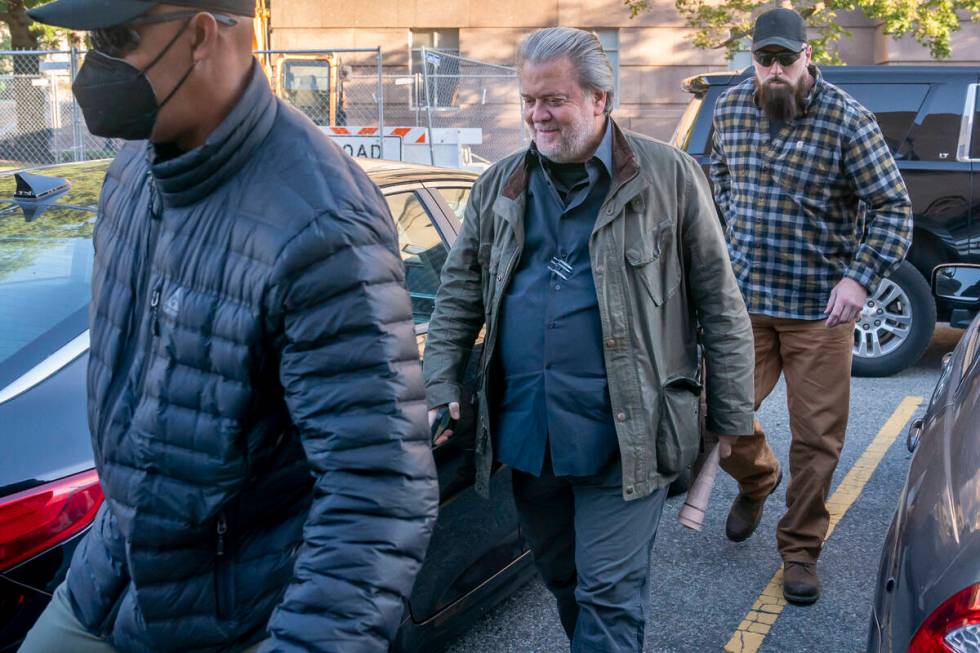 Steve Bannon, center, a longtime ally of former President Donald Trump, convicted of contempt o ...