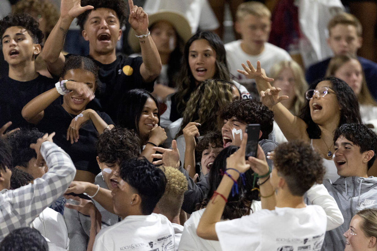 The Liberty student fan section raps during a Class 5A high school football game against Desert ...