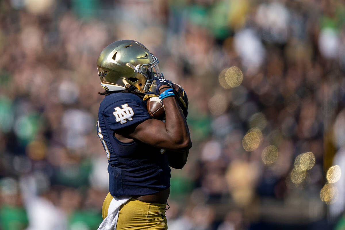 Notre Dame wide receiver Jayden Thomas (83) catches a long pass during the first quarter an NCA ...