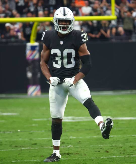 Raiders safety Duron Harmon (30) celebrates after a play against the Houston Texans during the ...