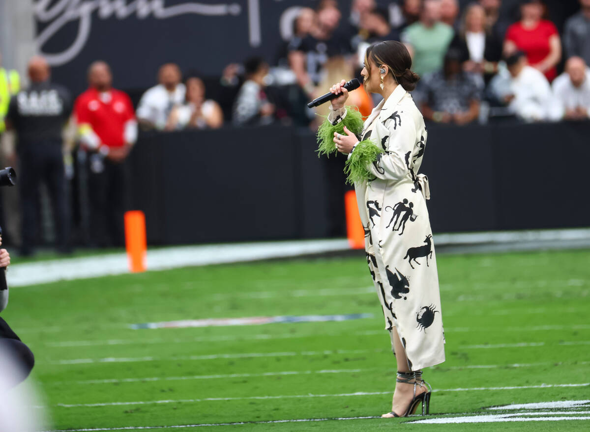 Jojo performs the national anthem before an NFL game at Allegiant Stadium on Sunday, Oct. 23, 2 ...