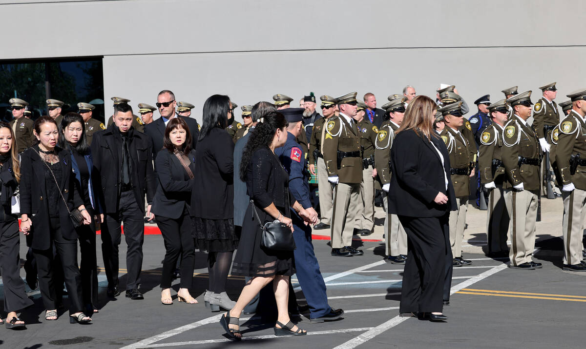 Family members of fallen Las Vegas police officer Truong Thai arrive at Central Church in Hende ...