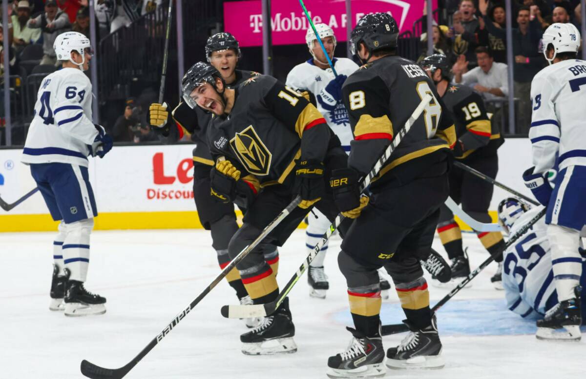 Vegas Golden Knights center Nicolas Roy (10) celebrates his goal against Toronto Maple Leafs go ...