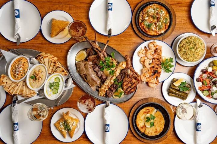 A fully provisioned table from Meráki Greek Grill, which opened its fourth location in Las Veg ...