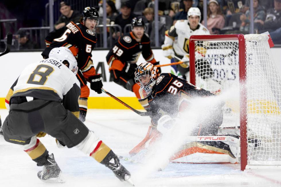 Golden Knights center Phil Kessel (8) attempts a goal against Ducks goaltender John Gibson (36) ...