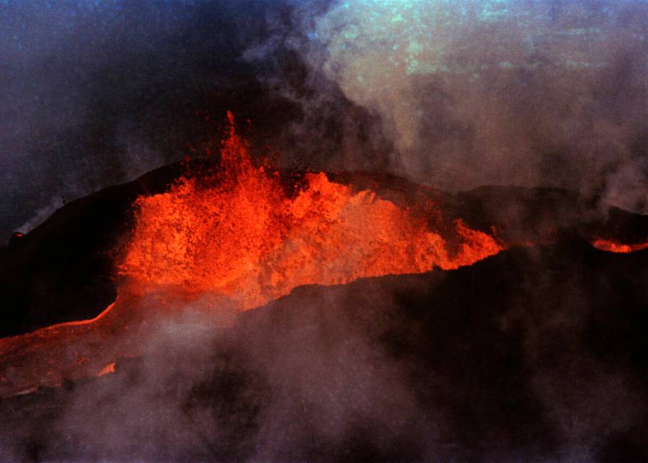 FILE - Molten rock flows from Mauna Loa on March 28, 1984, near Hilo, Hawaii. Hawaii officials ...