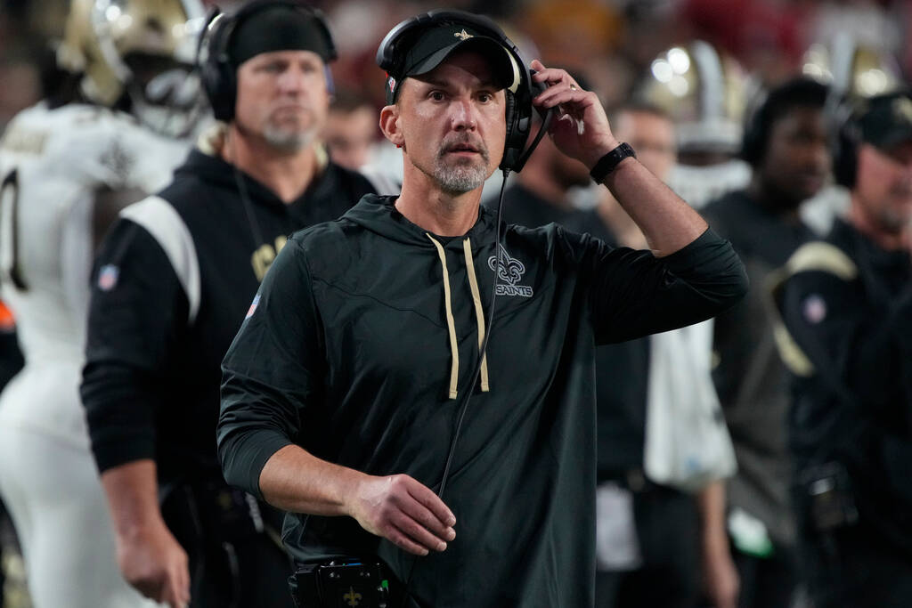New Orleans Saints head coach Dennis Allen sits on the sideline during the second half of an NF ...