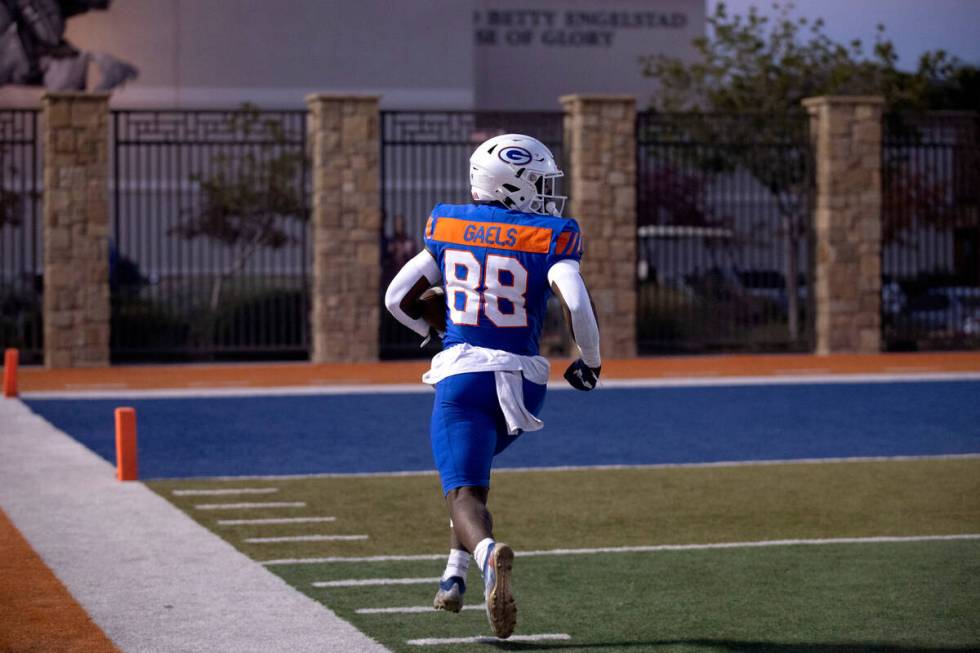 Bishop Gorman’s Jett Washington runs for a touchdown during a high school football game ...