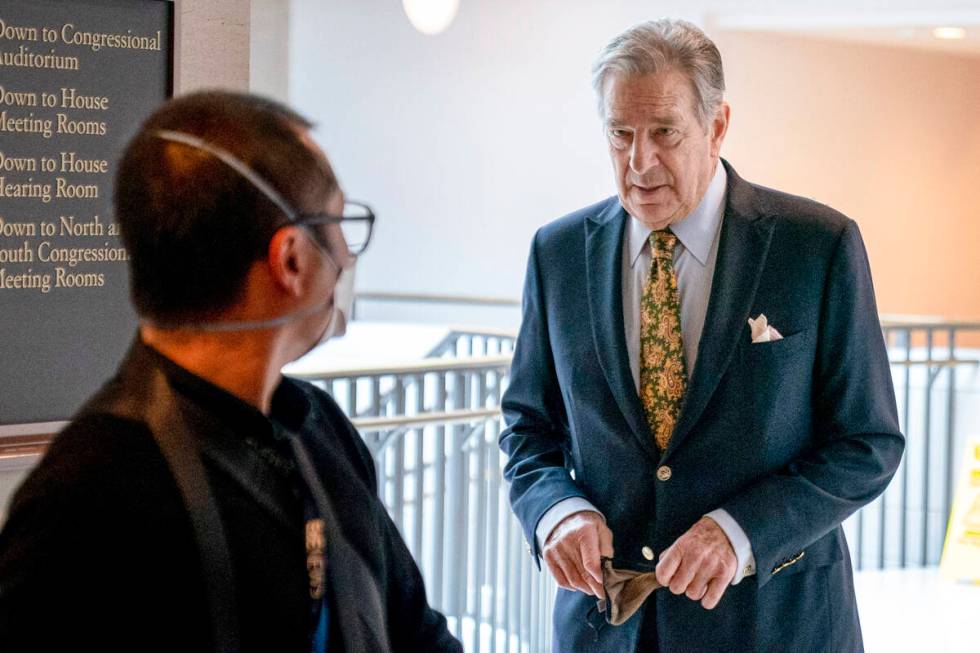 Paul Pelosi, right, the husband of House Speaker Nancy Pelosi, follows his wife as she arrives ...