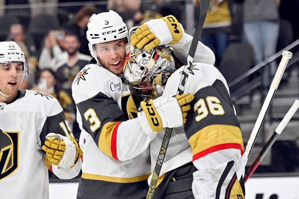 Vegas Golden Knights defenseman Brayden McNabb (3) hugs goaltender Logan Thompson after a shuto ...