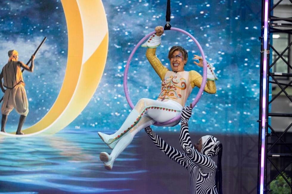 Hoda Kotb is shown working an aerial act from "O" in "Today in Vegas" on Oct. 31, 2022. (Nathan ...