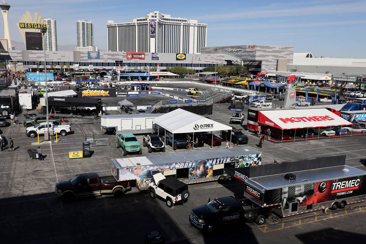 Workers set up for the Specialty Equipment Market Association (SEMA) trade show at the Las Vega ...
