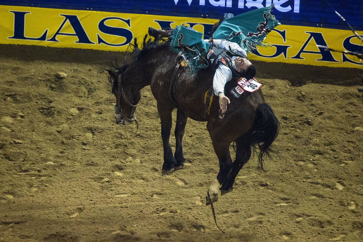 Bareback Rider Jess Pope of Waverly, KS., rides Night Crawler for a first place score during th ...