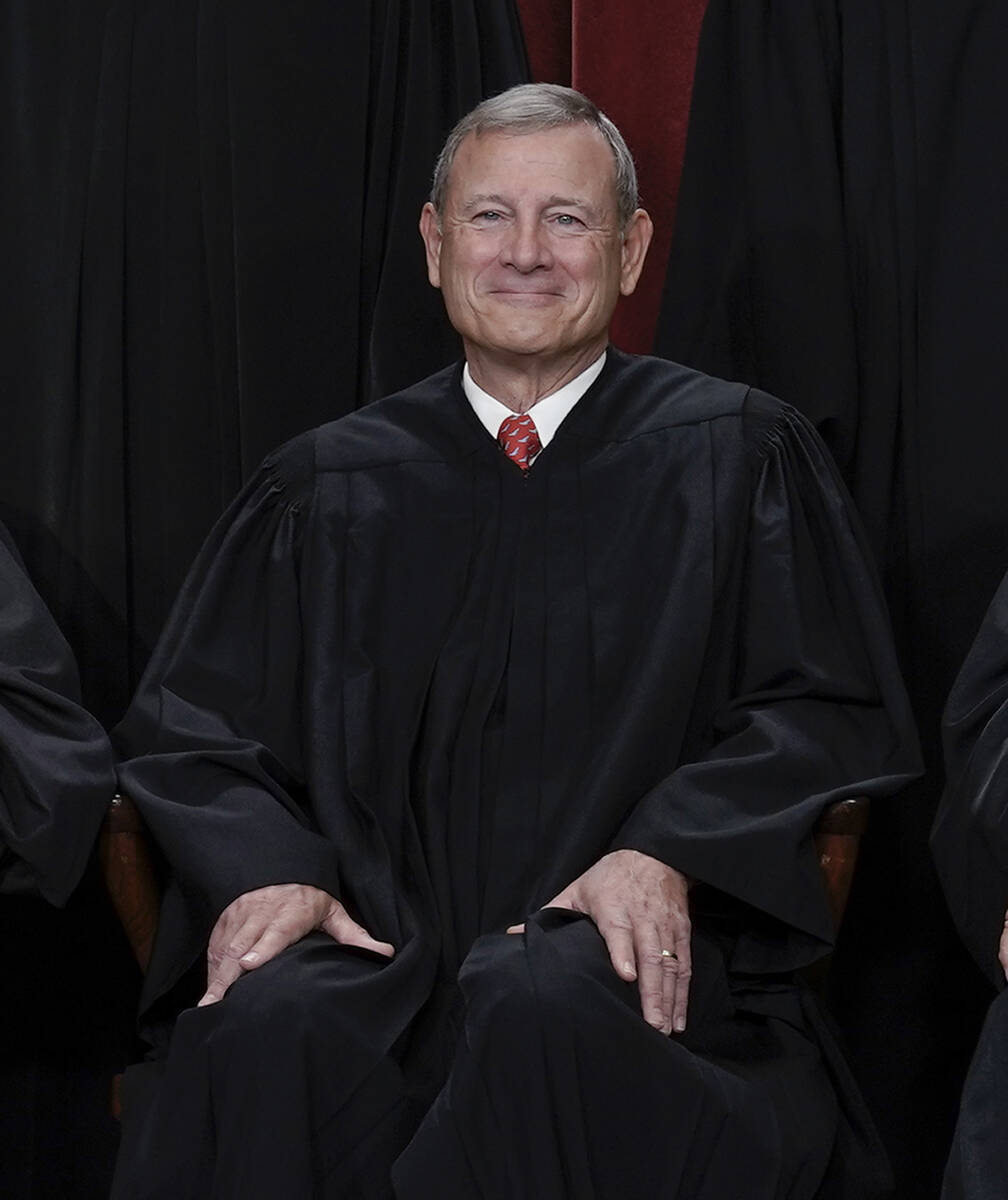 Chief Justice of the United States John Roberts joins other members of the Supreme Court as the ...