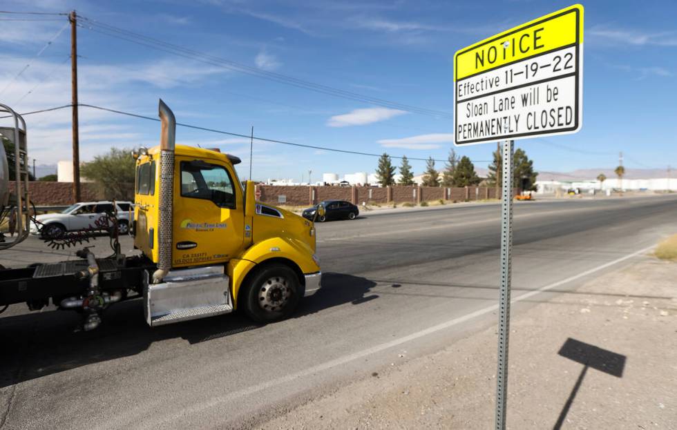 Traffic passes by the intersection of Sloan Lane at North Las Vegas Boulevard, which is slated ...