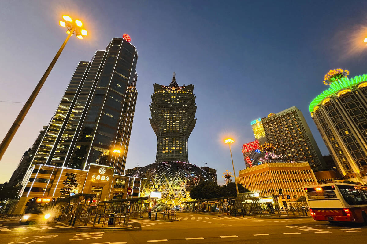 This July 11, 2022, file photo shows Grand Lisboa, center. (AP Photo/Kong)