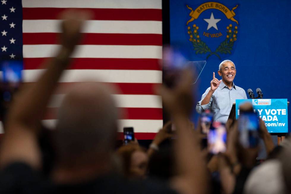 Former President Barack Obama speaks during a campaign rally organized by Nevada Democratic Vic ...