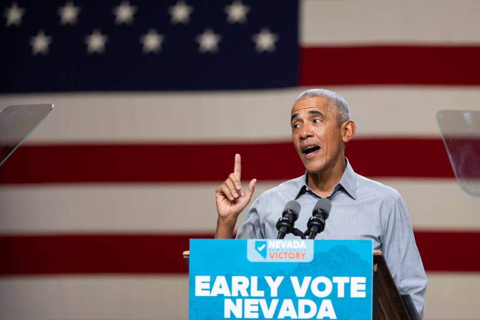 Former President Barack Obama speaks during a campaign rally organized by Nevada Democratic Vic ...