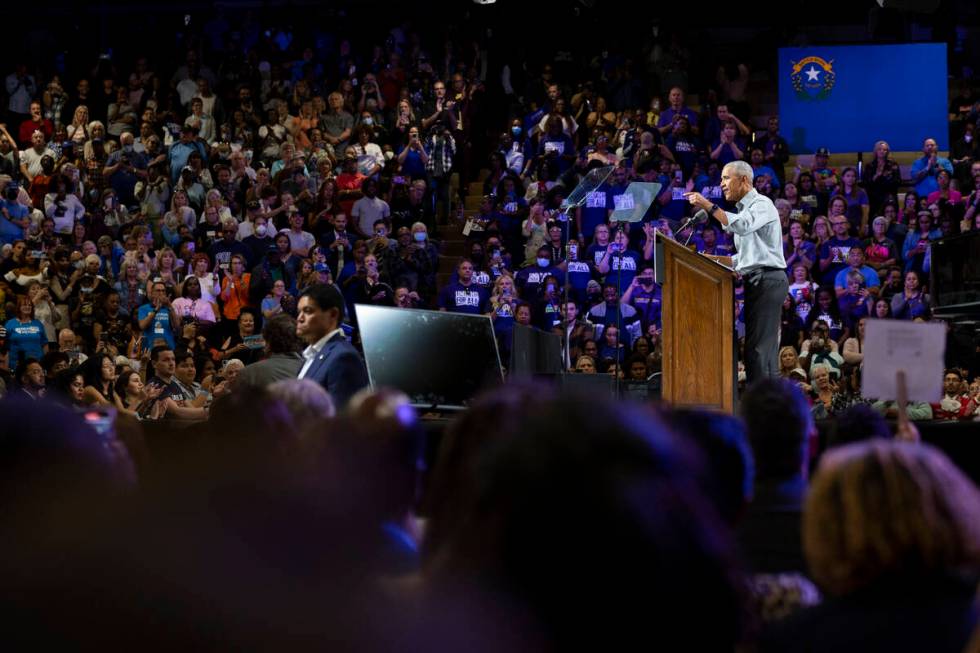 Former President Barack Obama speaks during a campaign rally organized by Nevada Democratic Vic ...