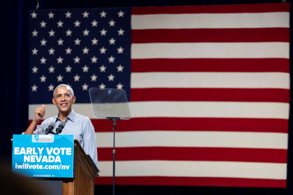 Former President Barack Obama speaks during a campaign rally organized by Nevada Democratic Vic ...