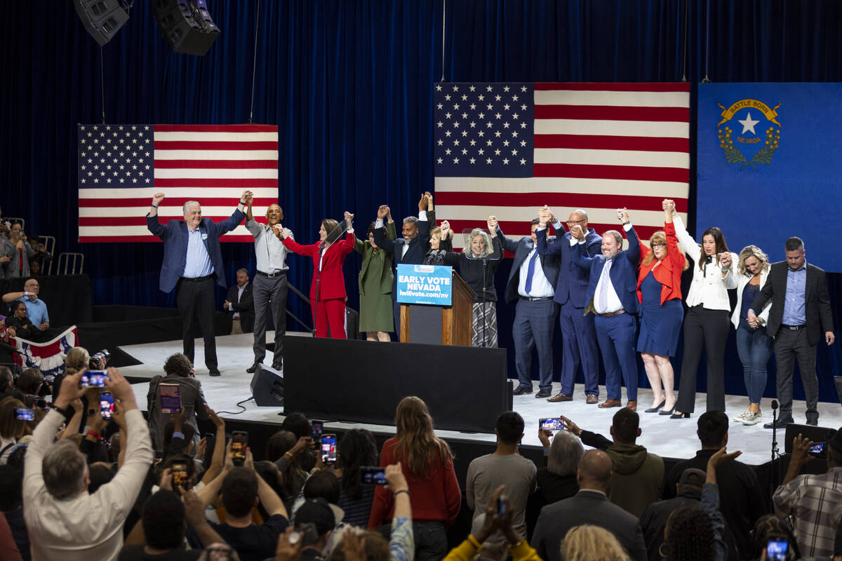 Governor Steve Sisolak, from left, with former President Barack Obama, and other elected Nevada ...
