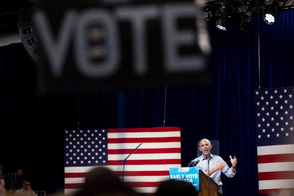 Former President Barack Obama speaks during a campaign rally organized by Nevada Democratic Vic ...