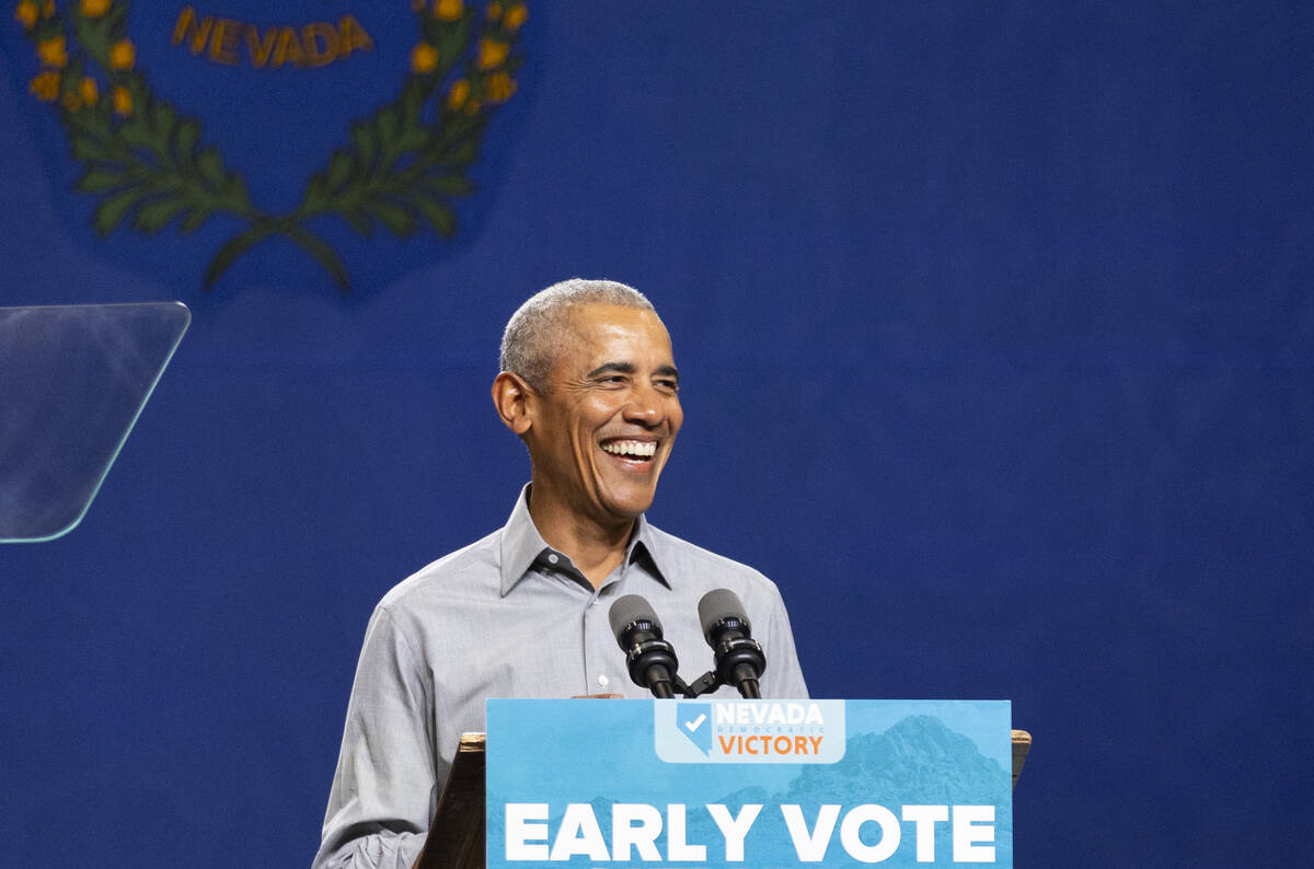 Former President Barack Obama speaks during a campaign rally organized by Nevada Democratic Vic ...