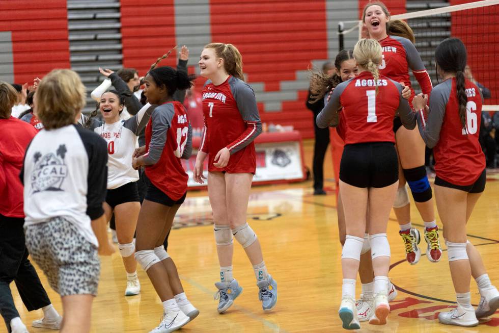 Arbor View celebrates after winning all three sets in a Class 4A girls state volleyball quarter ...