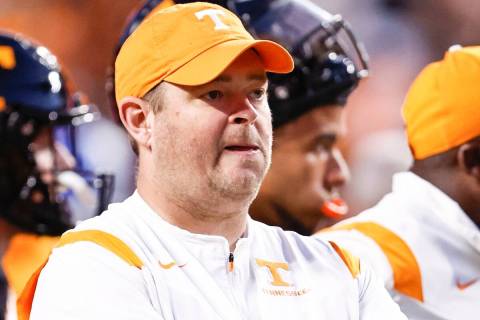 Tennessee head coach Josh Heupel watches as his team warms up before an NCAA college football g ...