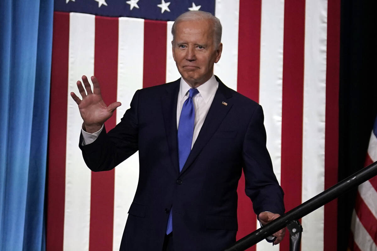 President Joe Biden waves as he arrives to speak about threats to democracy ahead of next week' ...