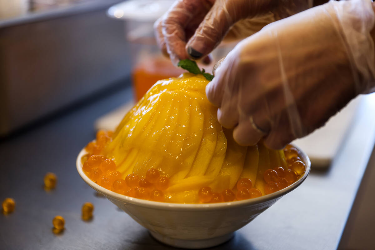 Amy Park, co-owner and manager, makes mango bingsoo, Korean shave ice, at Sweet Mong in Las Veg ...