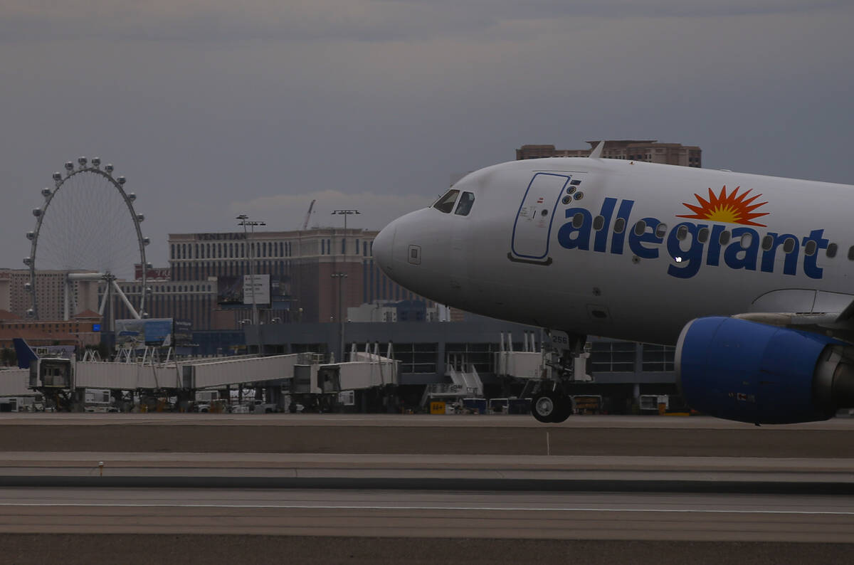 An Allegiant Air plane lands at Harry Reid International Airport on Tuesday, July 26, 2022, in ...