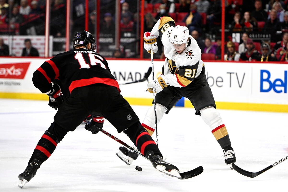 Vegas Golden Knights center Brett Howden (21) controls the puck against Ottawa Senators left wi ...