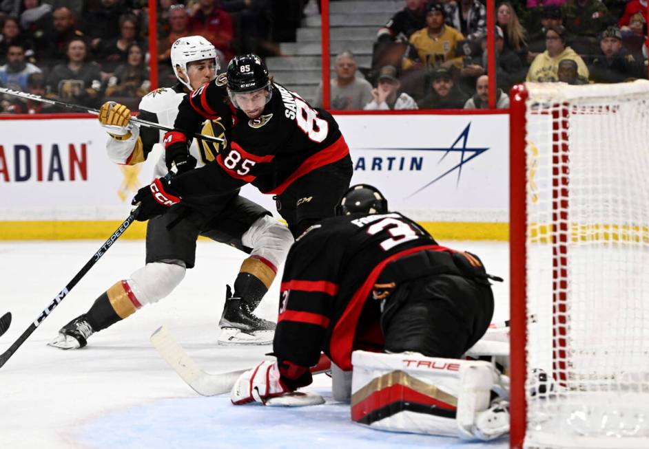 Ottawa Senators defenseman Jake Sanderson (85) is unable to defend against Vegas Golden Knights ...