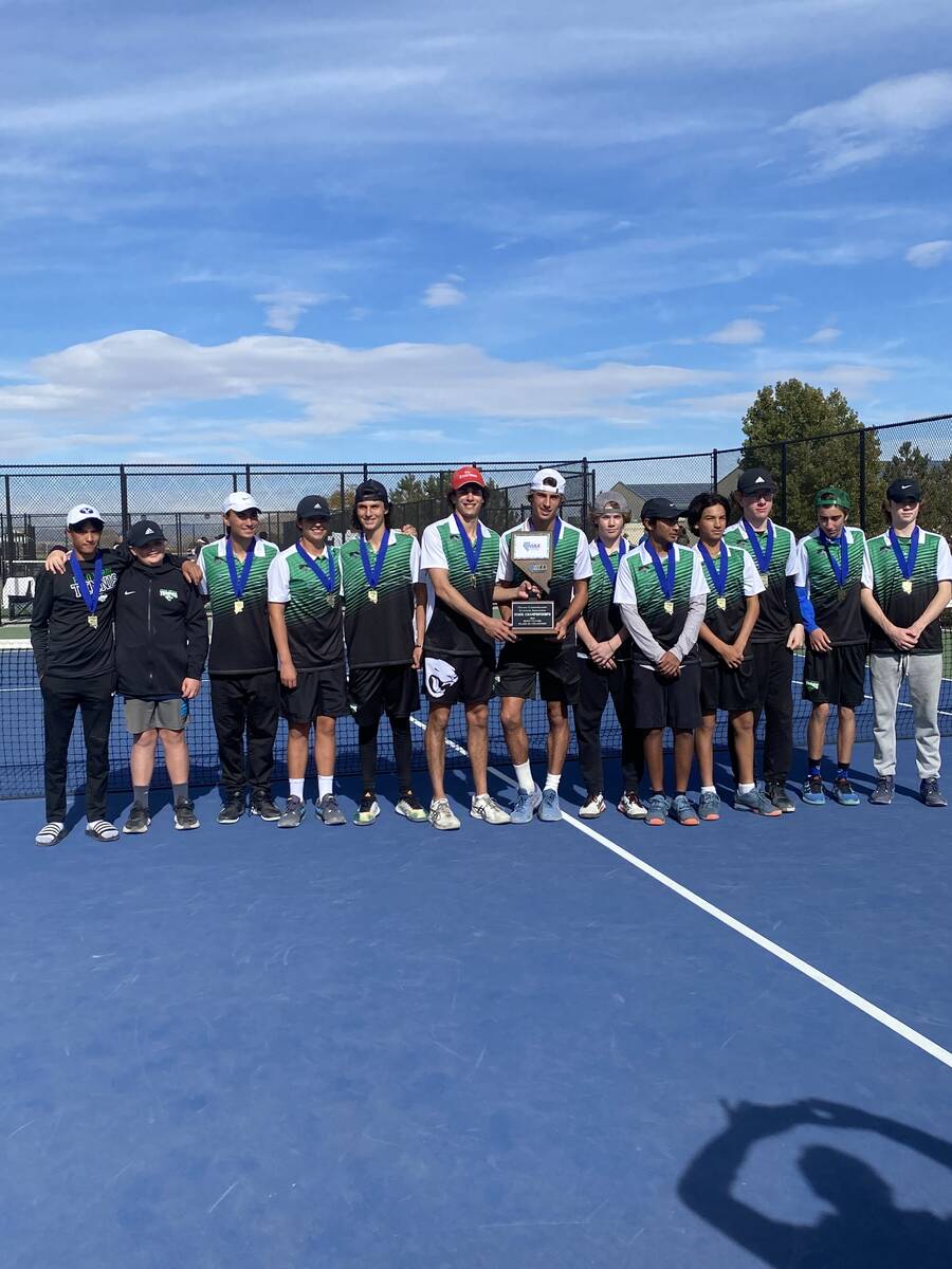 The Palo Verde boys tennis team poses with the Class 5A state championship trophy. (Tyler Marchant)